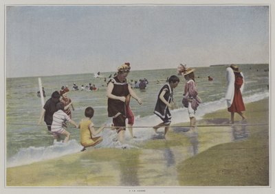 Dzieci bawiące się liną na plaży (kolorowe zdjęcie) autorstwa French Photographer