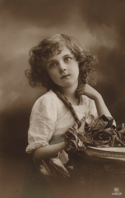 Śliczna dziewczyna z różami autorstwa French Photographer