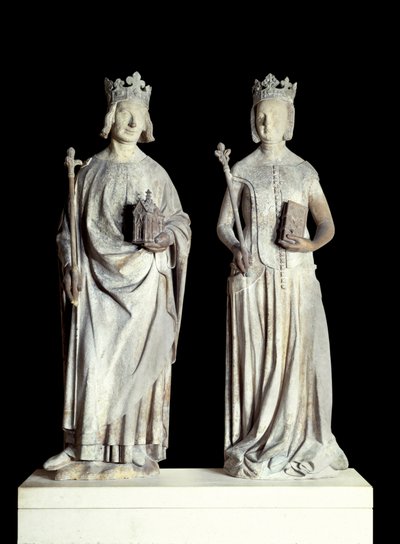 Art France: Posągi króla Francji Karola V znanego jako Karol Mądry (1338-1380) i królowej Francji Jeanne de Bourbon (1337-1378). Rzeźba w wapieniu z XIV wieku. Prawdopodobnie z fasady wschodniego wejścia do Luwru (dekor autorstwa French School