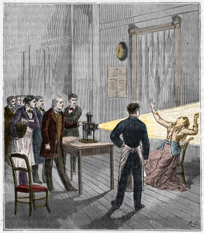 Katalepsja wytworzona pod wpływem światła - Francuski neurolog Jean Martin Charcot (1825-1893) badający fenomen hipnozy u pacjenta szpitala Salpetriere za pomocą latarni magicznej - Katalepsja - Jean Martin Charcot (1825-1893), francuski neu autorstwa French School