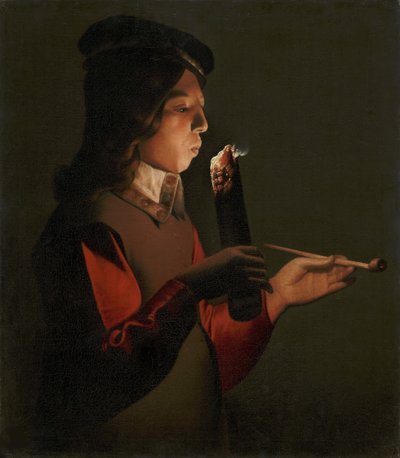 Młody chłopak z fajką, dmuchający na podpałkę, autorstwa La Tour, Georges, de (1583-1652). olej na płótnie autorstwa Georges de La Tour