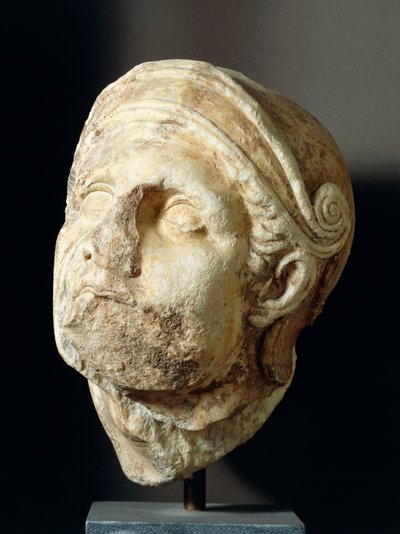 Głowa wojownika autorstwa Skopasa (340-420 pne) przed świątynią Ateny Alea w Tegea, IV wiek p.n.e. (zdjęcie) autorstwa Greek