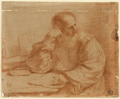 Brodaty mężczyzna siedzący przy stole autorstwa Guercino