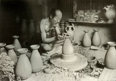 Garncarz za swoim kołem, 1910. autorstwa Herbert Ponting