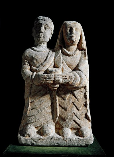 Sztuka iberyjska: statuetka pary składającej ofiarę. Rzeźba z Albacete w Hiszpanii. Madryt, IV-II wiek p.n.e., Narodowe Muzeum Archeologiczne autorstwa Iberian