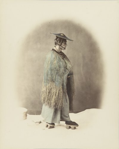 Japończyk w tradycyjnym stroju (ręcznie kolorowane czarno-białe zdjęcie) autorstwa Japanese Photographer