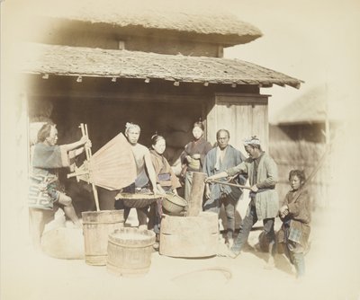 Łuskanie ryżu w Japonii (ręcznie kolorowane czarno-białe zdjęcie) autorstwa Japanese Photographer
