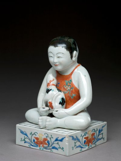 Chłopiec z psem siedzący na kwadratowym stole shogi, naczynia związane z Kakiemon, japońskie, 1680-1700 (naczynia ceramiczne z niebieską glazurą) autorstwa Japanese School