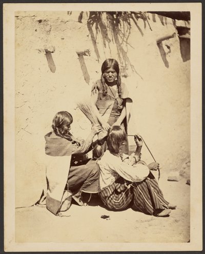 Fryzjer Moki autorstwa John K. Hillers