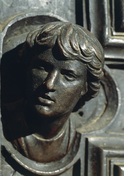 Głowa Giuliano de Medici, detal z brązu na drzwiach autorstwa Luca della Robbia (1400-1481). Nowa Zakrystia, Katedra Santa Maria del Fiore we Florencji. Włochy autorstwa Luca Della Robbia