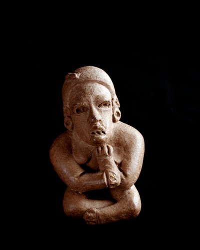 Sztuka przedkolumbijska, cywilizacja Majów, okres przedklasyczny: gliniana statuetka przedstawiająca siedzącą kobietę ze skrzyżowanymi rękami i nogami. z San Agustin Acasaguastlan El Progeso w Gwatemali. Ciemny. 10,7 cm Miasto Gwatemala, Museo Nazionale di autorstwa Mayan Mayan