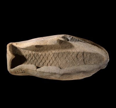 Mezopotamie: pleśń z terakoty w kształcie ryby. Około 1800 r. p.n.e. Z królewskich potraw Pałacu Króla Zimri Lima w Mari. Paryż, Luwr autorstwa Mesopotamian