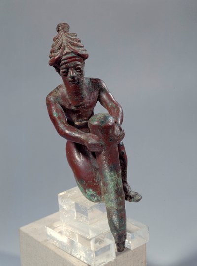 Mezopotamia: miedziana figura z fundamentu przedstawiająca boga pchającego gwóźdź. Około 2150 pne. Od Tello. Paryż, Luwr autorstwa Mesopotamian Mesopotamian