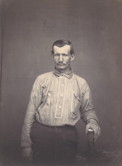 Człowiek posiadający Księgę Urzędu Patentowego, ca. 1857. autorstwa Oliver H. Willard.