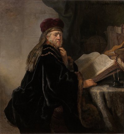 Uczony siedzący przy biurku Uczony w swoim gabinecie autorstwa Rembrandt van Rijn