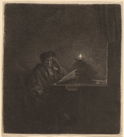 Uczeń przy stole przy świecach autorstwa Rembrandt van Rijn