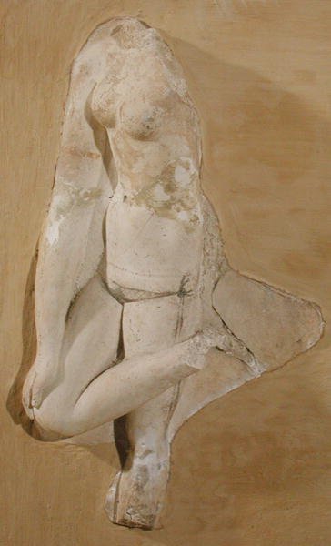 Relief przedstawiający ciało kobiety, Tunezja (stiuk) autorstwa Roman