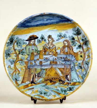 Przedstawienie bankietu plenerowego na talerzu ceramicznym Talavera de la reina (Hiszpania). Początek XVI wieku. Mediolan, Museo del Castello. autorstwa Spanish School