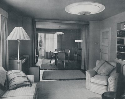 Jadalnia i salon przedzielone jedynie ciężkimi zasłonami w atrakcyjnym nowoczesnym splocie, 1942 autorstwa Unbekannt