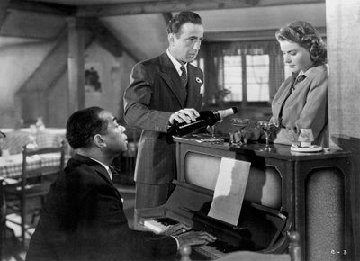 Ingrid Bergman, Humphrey Bogart i Louis Armstrong w Casablance, 1942 r. autorstwa Unbekannt