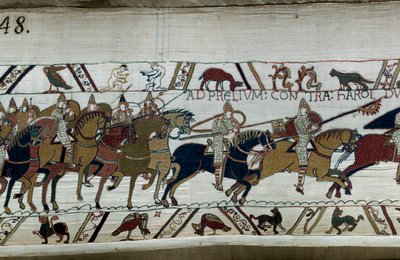 Podbój Anglii przez księcia normańskiego Wilhelma Zdobywcę (1027-1087) w 1066: jego armia zbliża się do armii Harolda II a Hastings Na dole po lewej stronie, dwaj nadzy mężczyźni Fragment gobelinu z Bayeux lub Haftu królowej Matyldy autorstwa Unknown artist