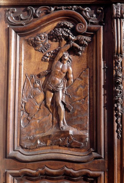 Męczeństwo San Sebastian, fragment rzeźbionych drewnianych drzwi kościoła Niepokalanego Poczęcia, Menton. autorstwa Unknown artist