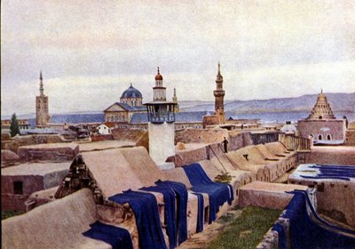 Niebieskie tkaniny bawełniane suszone na dachach farbiarzy w Damaszku (Syria). autorstwa Unknown photographer