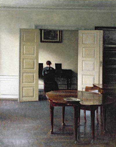 Wnętrze z kobietą grającą na pianinie, 1910 autorstwa Vilhelm Hammershoi