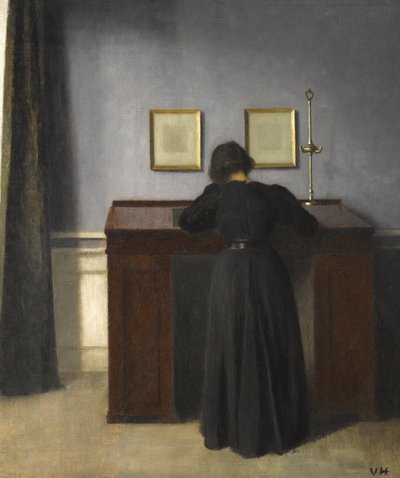 Ida stojąca przy biurku, 1900 autorstwa Vilhelm Hammershoi