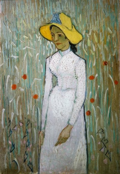 Młoda dziewczyna stojąca przed polem pszenicy autorstwa Vincent van Gogh
