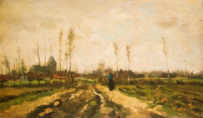 Krajobraz z kościołem i domami autorstwa Vincent van Gogh
