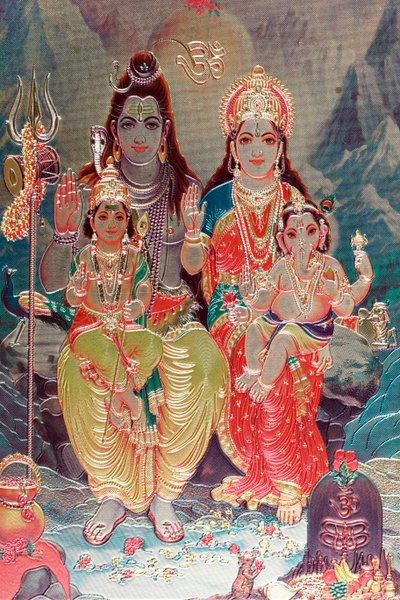 Bóg Shiva i Bogini Parvati z synem Ganesha. autorstwa . .
