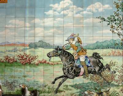 Widok wnętrza, panel kafelkowy, malarz Furcy Ernest Tondeur, egzekutor Boch Frères La Louvière, drugi panel przedstawia scenę polowania z galopującym jeźdźcem z rogiem myśliwskim autorstwa . .