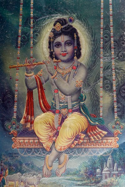Pan Kryszna z fletem. Hinduski Bóg. autorstwa . .