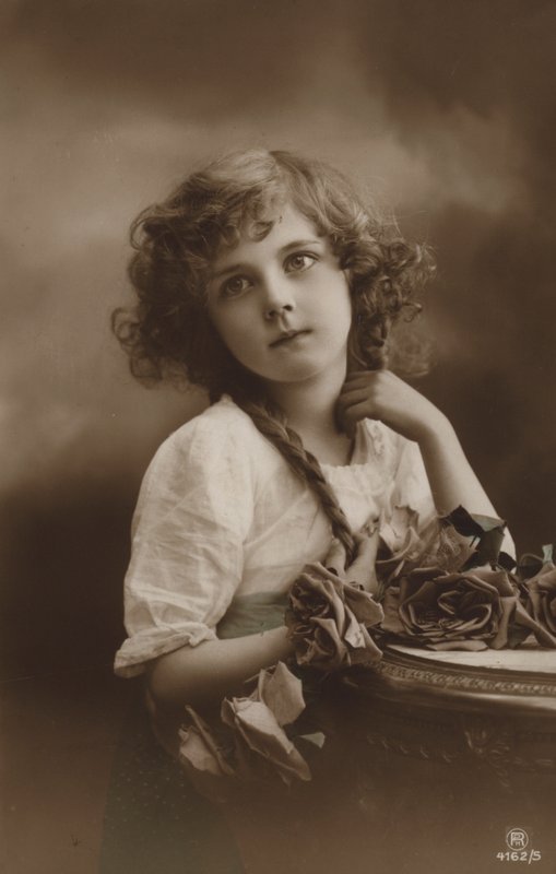 Śliczna dziewczyna z różami autorstwa French Photographer