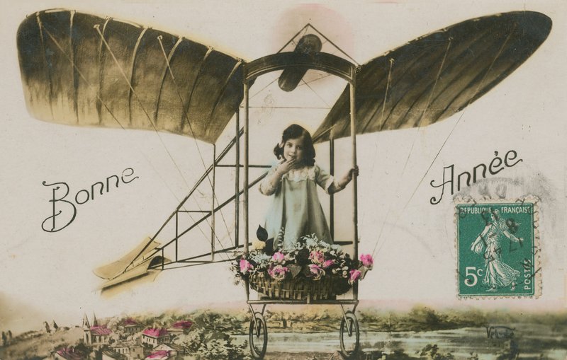 Kartka noworoczna dziewczynki w samolocie, 1913 (zdjęcie ręcznie kolorowane) autorstwa French Photographer