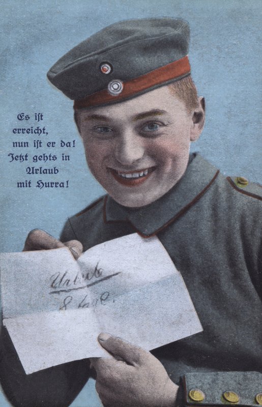 Wesoły niemiecki żołnierz z zawiadomieniem o wyjeździe (kolorowe zdjęcie) autorstwa Photographer German