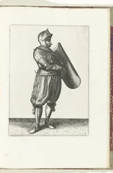 Ćwiczenie z tarczą i rapierem: żołnierz trzyma tarczę lekko do przodu, aby narysować rapier (nr 4), 1618 Nassausche Wapen-Handelinge, van Schilt, Szpiedzy, Rappier i Tarcza: przedstawione beyde figuerlick i oprawione w nowy porządek