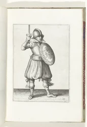 Ćwiczenie z tarczą i kolcem: Żołnierz przedstawia swój rapier ręką nie wyżej niż jego twarz (nr 19), 1618 Nassausche Wapen-Handelinge, van Schilt, Szpiedzy, Rappier i Tarcza: przedstawione beyde figuerlick i oprawione w nowy porządek