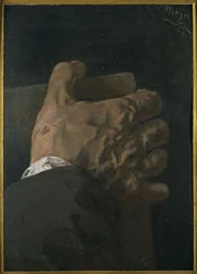 Męska dłoń trzymająca tablicę