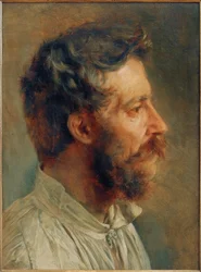 Głowa brodatego pracownika w profilu