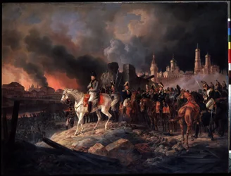 „Pożar Moskwy 15/09/1812“. Gubernator miasta, hrabia Rostopczyn, każe podpalić miasto w chwili przybycia wojsk Napoleona I. Cesarz Napoleon I (1769-1821) przed płonącą Moskwą, po prawej rozciąga się Kreml.