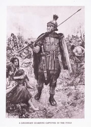 Legionista strzegący jeńców na polu, ilustracja z Żołnierza rzymskiego, 1928