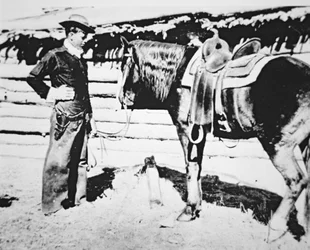 Butch Cassidy (1866-1908/09) z koniem (zdjęcie b/w)