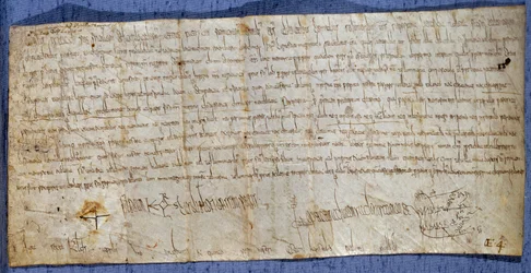 Dokument króla Karola Wielkiego (Karola I, Karola Wielkiego lub Carolusa Magnusa) (742-814), zwalniający opactwo Saint-Denis z opłat drogowych podczas jarmarku. Koniec VIII wieku. Paryż, Archiwum Narodowe