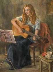 Mikołaj gra na gitarze