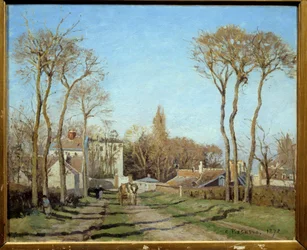 Wjazd do wsi Voisins-le-Bretonneux. Obraz Camille