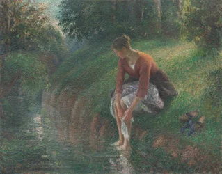 Kobieta kąpiąca się w strumieniu