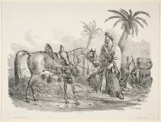 Siedzący Arab trzymający uzdę konia arabskiego