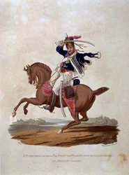 Kapral dziesiątego pułku lub Królewski Huzar Huzarów Własnych Księcia Walii w Rewizji Orderu, z „Kostiumy Armii Imperium Brytyjskiego, zgodnie z ostatnimi przepisami z 1812 r.”, wyryty przez J.C. Stadlera, pub.